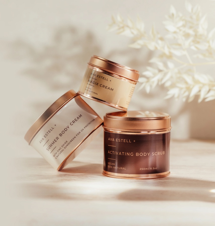 Ava Estell body cream and scrub jars.